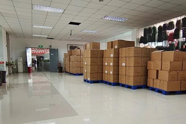 Chinese bag factory warehouse with packed export cartons ready for shipment