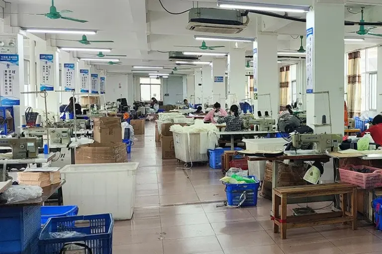 Chinese bag factory production line with workers preparing custom bag orders